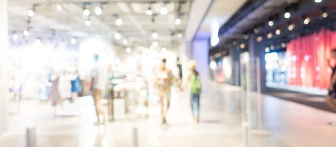 Abstract blur and defocused shopping mall in department store interior for background