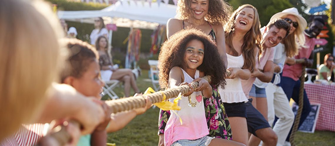 Game Of Tug Of War At Summer Garden Fete